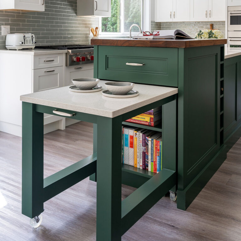 Spaces14-home-renovation-port-moody-5 Stylish kitchen island featuring book shelf and coffee table